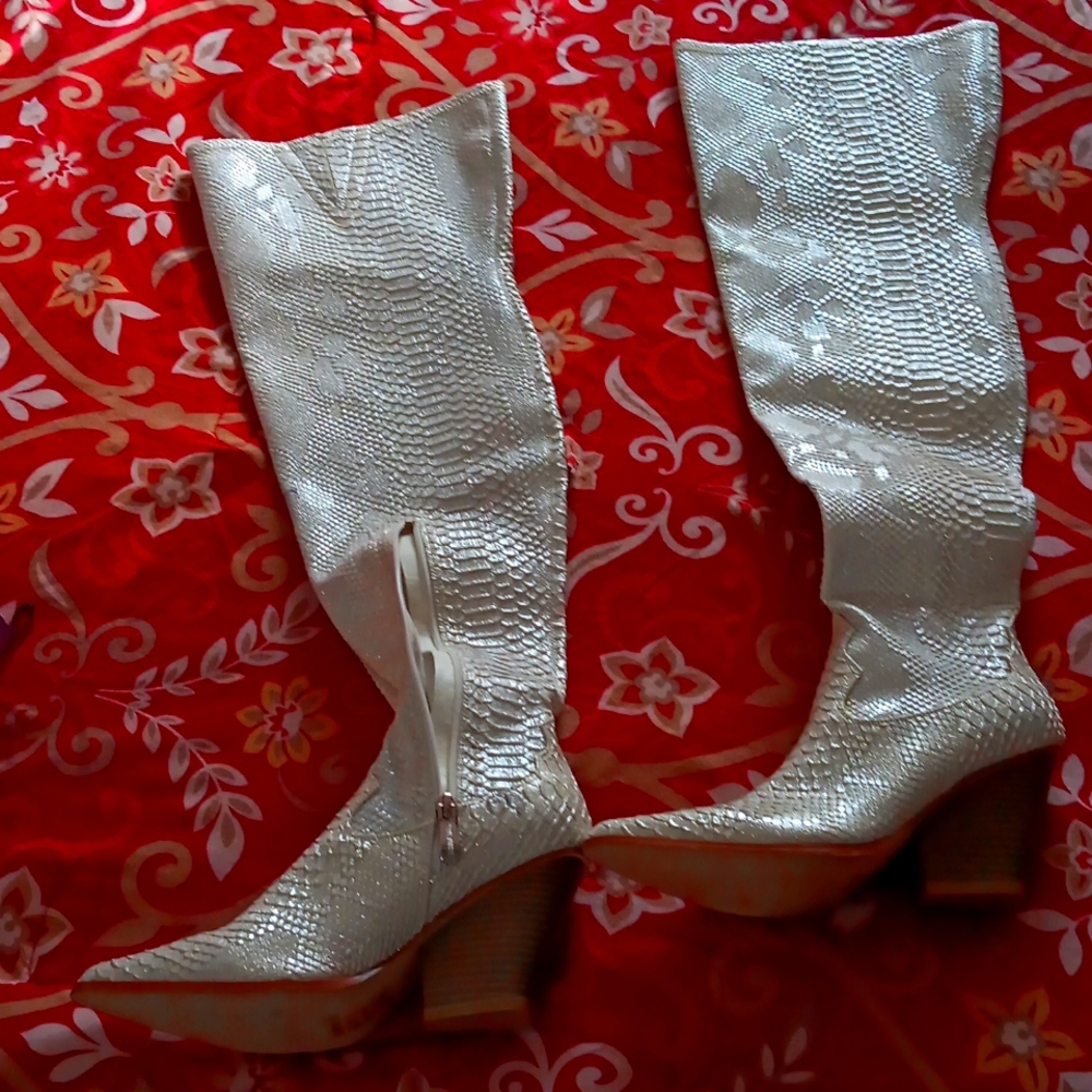 Snakeskin print boots